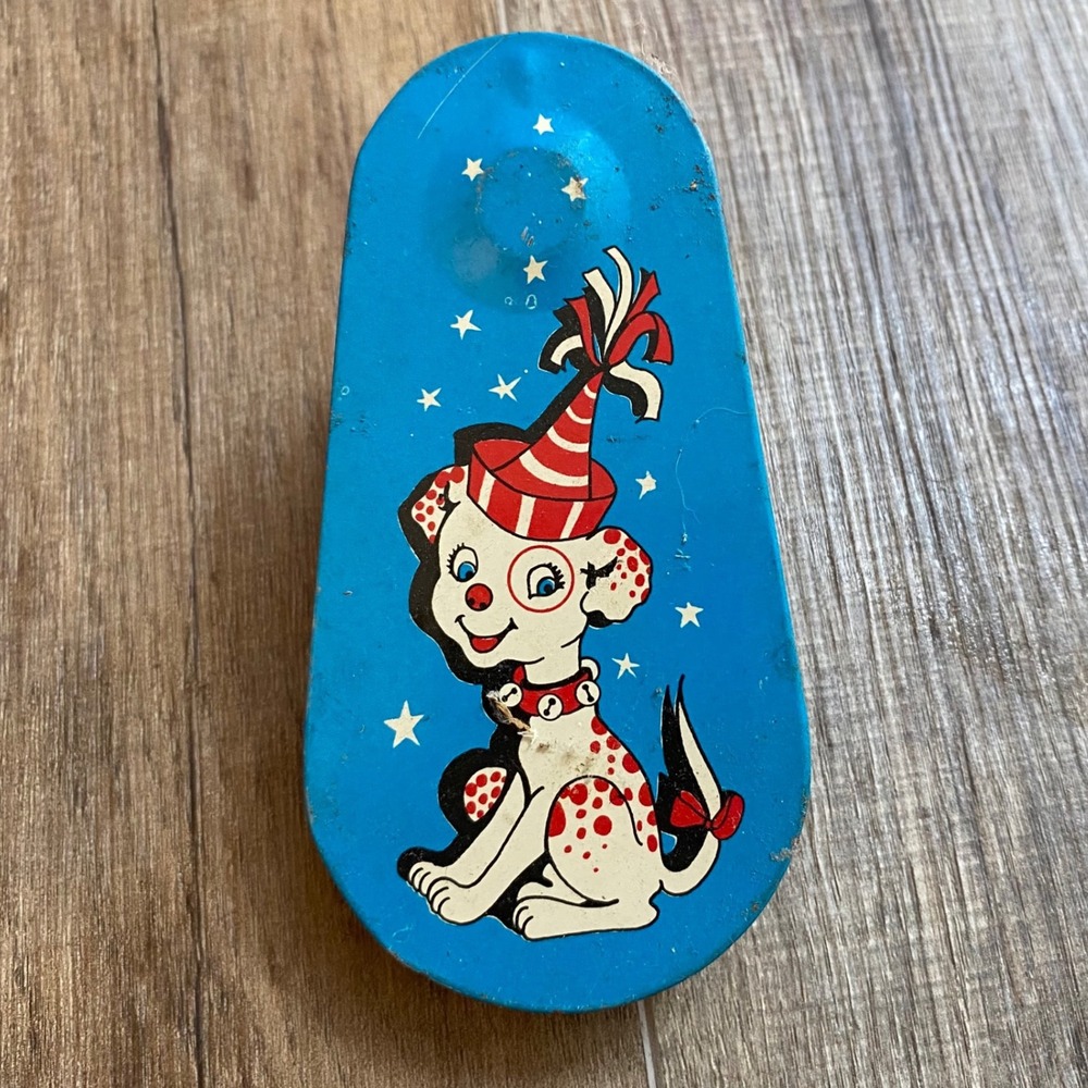 Vintage Tin Litho Clicker Toy Blue Pink Clown Puppy Dog Party Hat Noise Maker